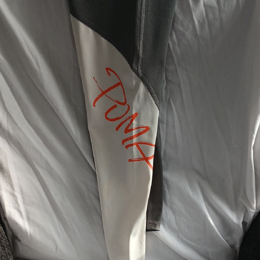 PUMA Gray and White Leggings with Orange Logo